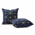 Decorative Throw Pillows - Set of 2 Velvet Cushions featuring navy blue with geometric gold pattern.